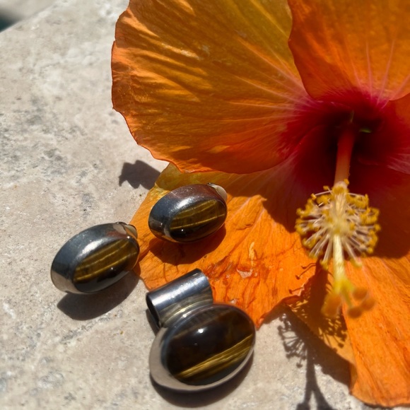 Jewelry - Genuine tiger eye clip on earrings and pendant set in sterling silver.